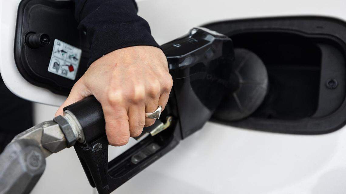 Kelley Currin pumps fuel at almost $4 per gallon on Monday, March 14, 2022, on Bryant Irving Road in Fort Worth. Kelley Currin pumps fuel at almost $4 per gallon on Monday, March 14, 2022, on Bryant Irving Road in Fort Worth.