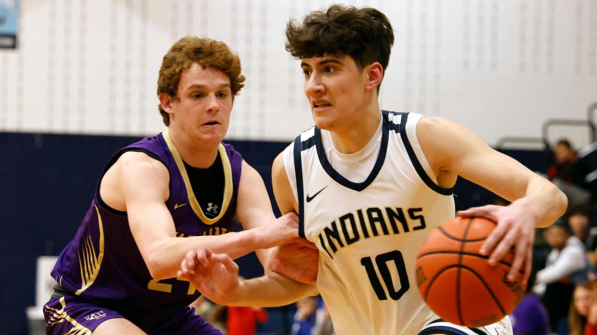 Keller forward Steven Ramirez (10) turns the corner on Timber Creek forward Carson Porter (24) in the third period of a high school basketball game in the Keller High School gym in Keller Texas, Friday, Feb. 02, 2024.