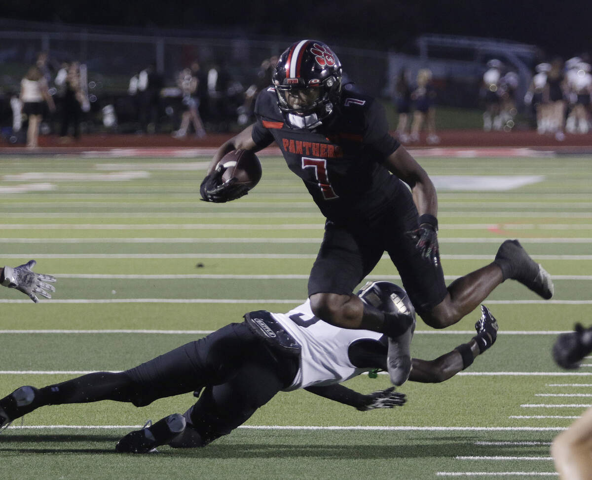 Colleyville’s Hayden West is upended by The Colony’s defense during their game at Mustang -Panther Stadium on Friday, Sep. 12, 2025.