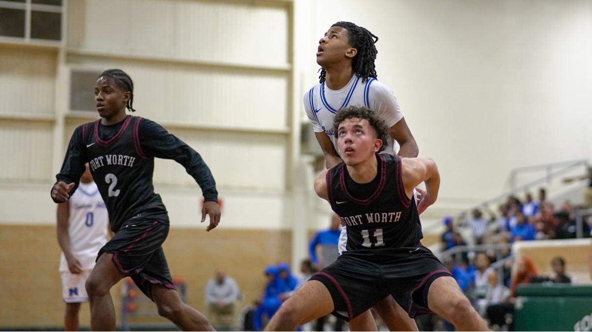 Fort Worth Southwest’s Sage Gonzalez blocks out on a shot against Fort Worth Eastern Hills in a boys District 8-4A contest on Tuesday, January 14, 2025 at Billingsley Field House in Fort Worth, Texas.