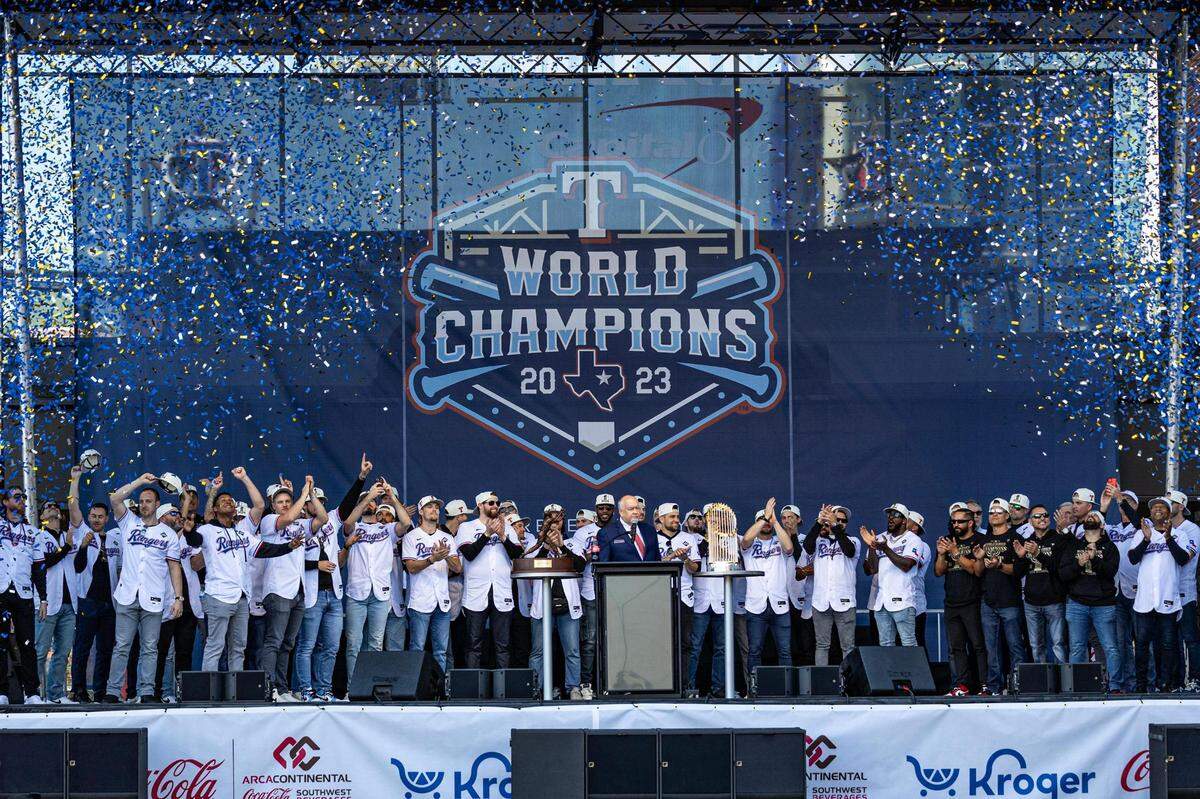 The Texas Rangers celebrate their 2023 World Series Championship during their Championship Ceremony at the Texas Live! Plaza in Arlington on Friday.