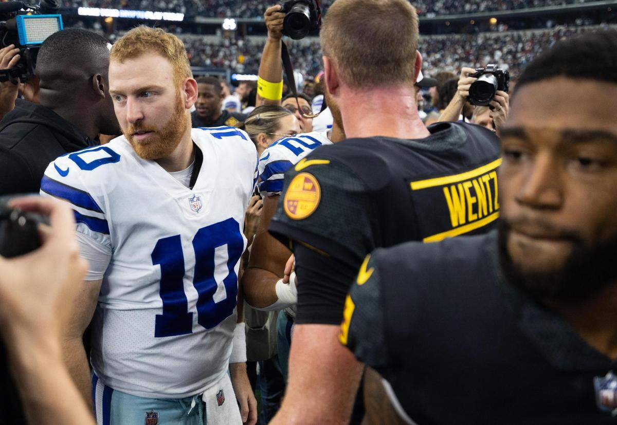 Dallas Cowboys Cooper Rush shakes hands with Washington Commanders after the game Sunday, Oct. 2, 2022, at AT&T Stadium in Arlington.