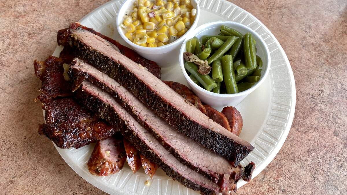 Brisket with jalapeno sausage and ribs at Jambo’s BBQ Shack’s Arlington location on West Division Street.