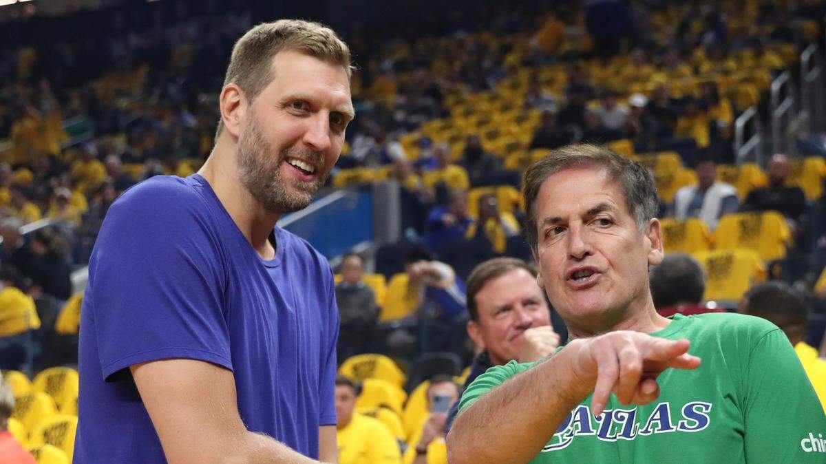 Dirk Nowitsky, left, talks with Dallas Mavericks owner Mark Cuban before Game 2 of the NBA basketball playoffs Western Conference finals in May.