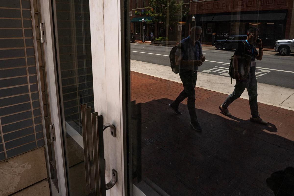 A man walks by the empty and closed Sundance 11 theater on Houston Street in downtown Fort Worth on Wednesday, July 24, 2024.