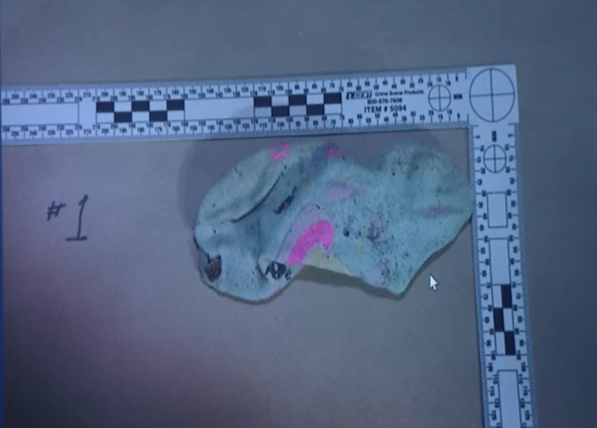 A photo of one of Athena Strand’s socks, which was found behind the shed where Tanner Horner was living, was shown during Horner’s capital murder trial on Thursday, April 9, 2026.