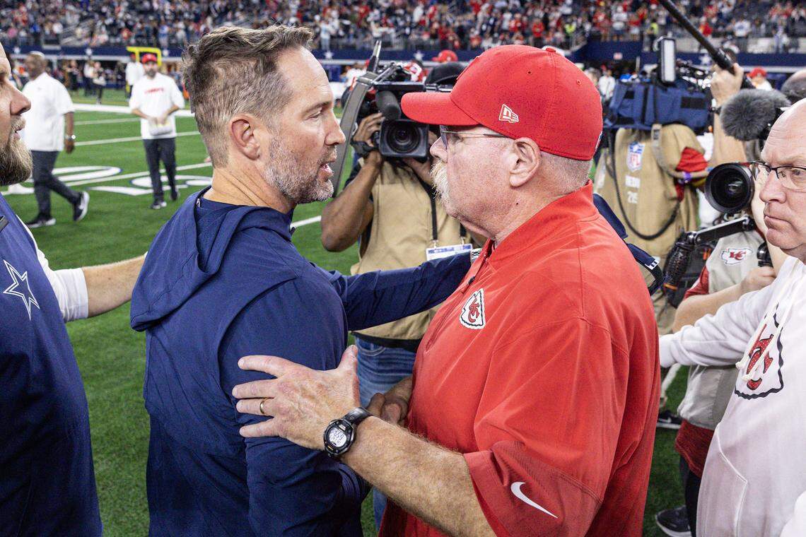 Cowboys head coach Brian Schottenheimer and Chiefs head coach Andy Reid greet each other after an NFL game between the Dallas Cowboys and the Kansas City Chiefs at AT&T Stadium in Arlington on Thursday, Nov. 27, 2025. The Cowboys won 31-28.
