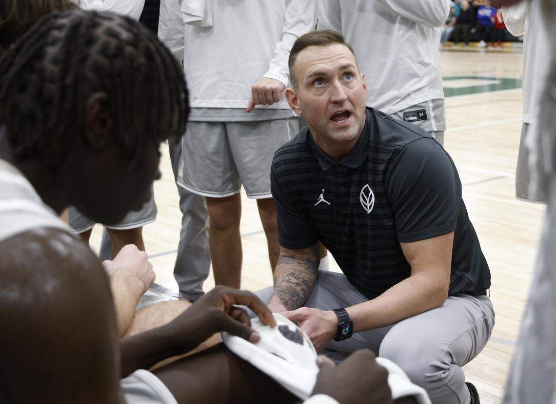 Birdville head coach Anthony Holman talks to the team during a timeout against Denton Ryan in the first half of a UIL basketball game at Birdville High School in North Richland Hills, Texas, Tuesday Feb. 17, 2026.