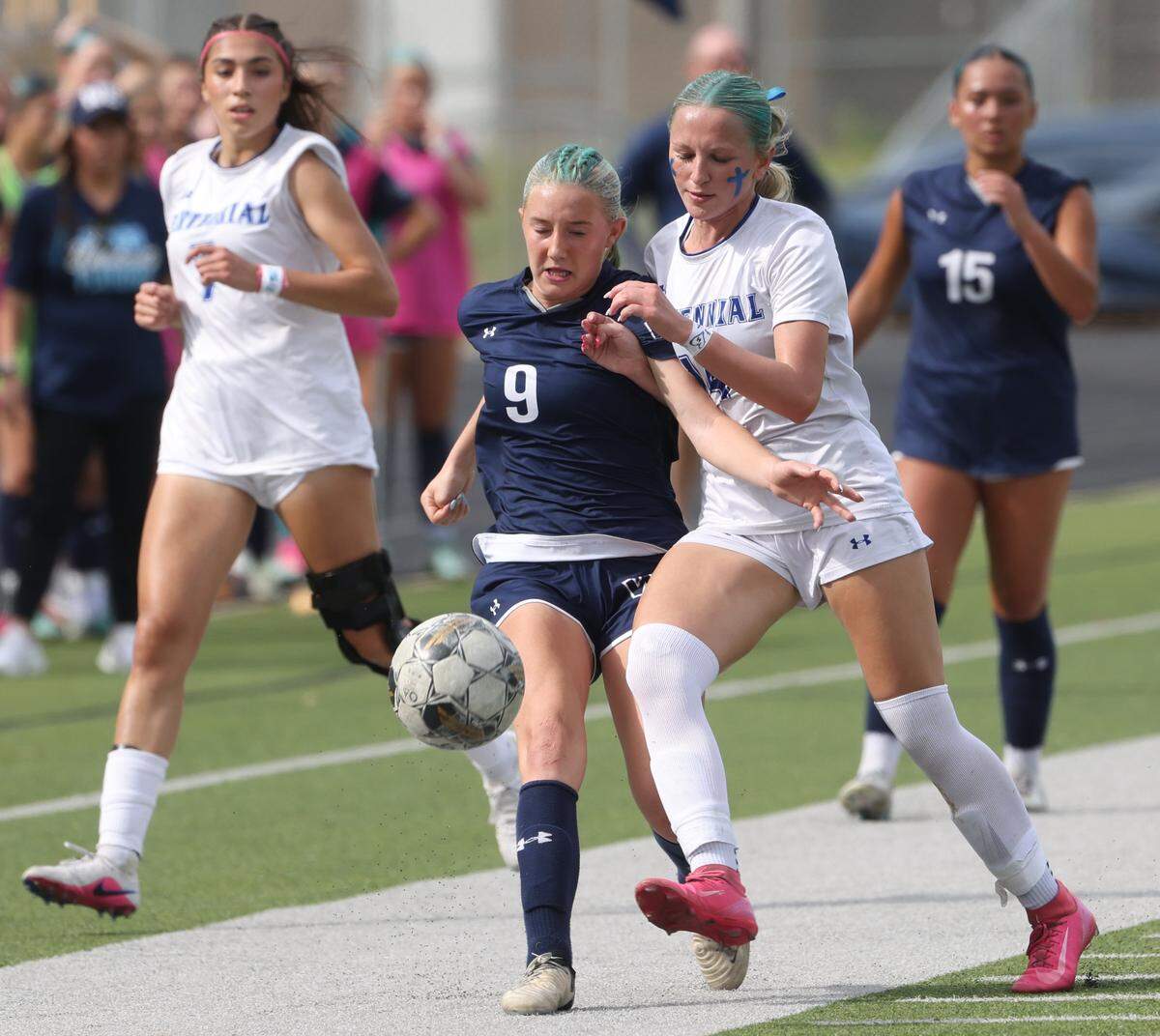 Prosper Walnut Grove midfielder Brynlie Ward (9) and Burleson Centennial midfielder Brayden Taylor (14) battle for possession during the second half of a UIL Conference 5A Division I state semifinal soccer game at Keller ISD Athletic Complex in Keller, Tx. Friday, April 03, 2026.