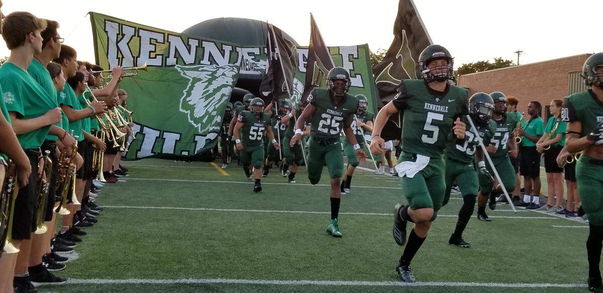 Kennedale takes the field against Midlothian Heritage on Friday, September 9, 2019. Darren Lauber.