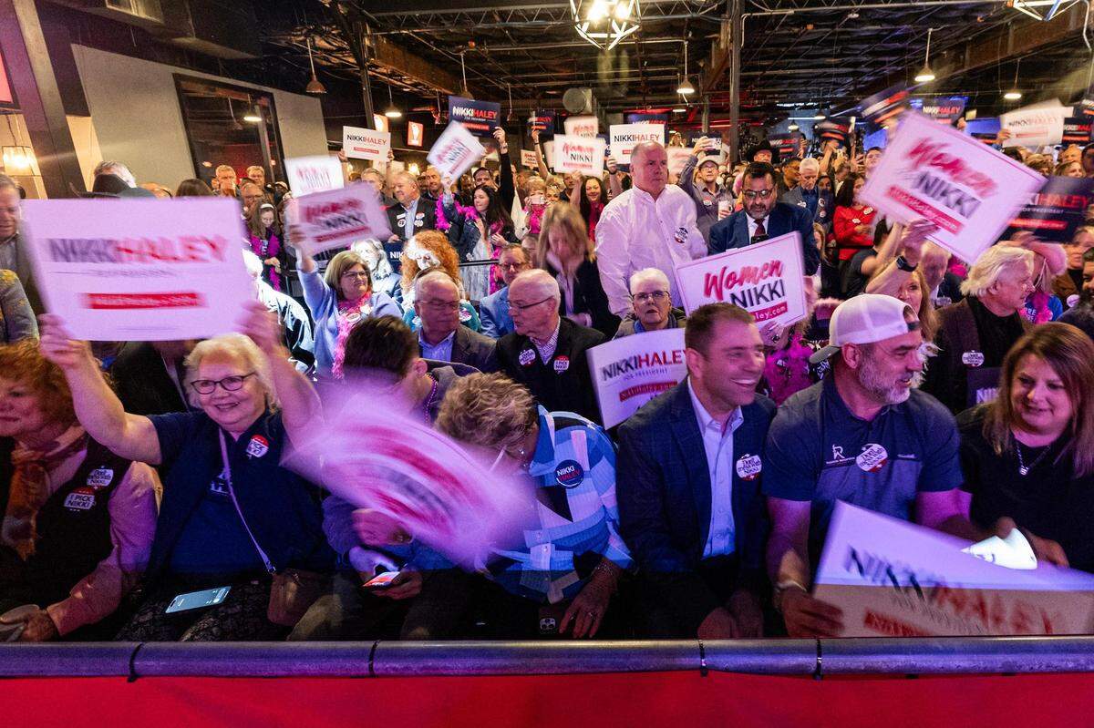 Supporters of Republican presidential candidate Nikki Haley wave their signs during her presidential campaign rally at the Southside Music Hall in Dallas on Thursday, Feb. 15, 2024.