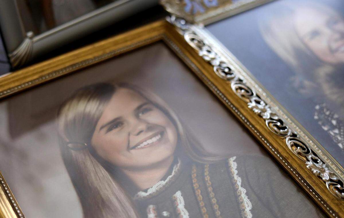 Jim Walker keeps photographs of his sister, Carla Walker, who was murdered when he was 12 years old in 1974.