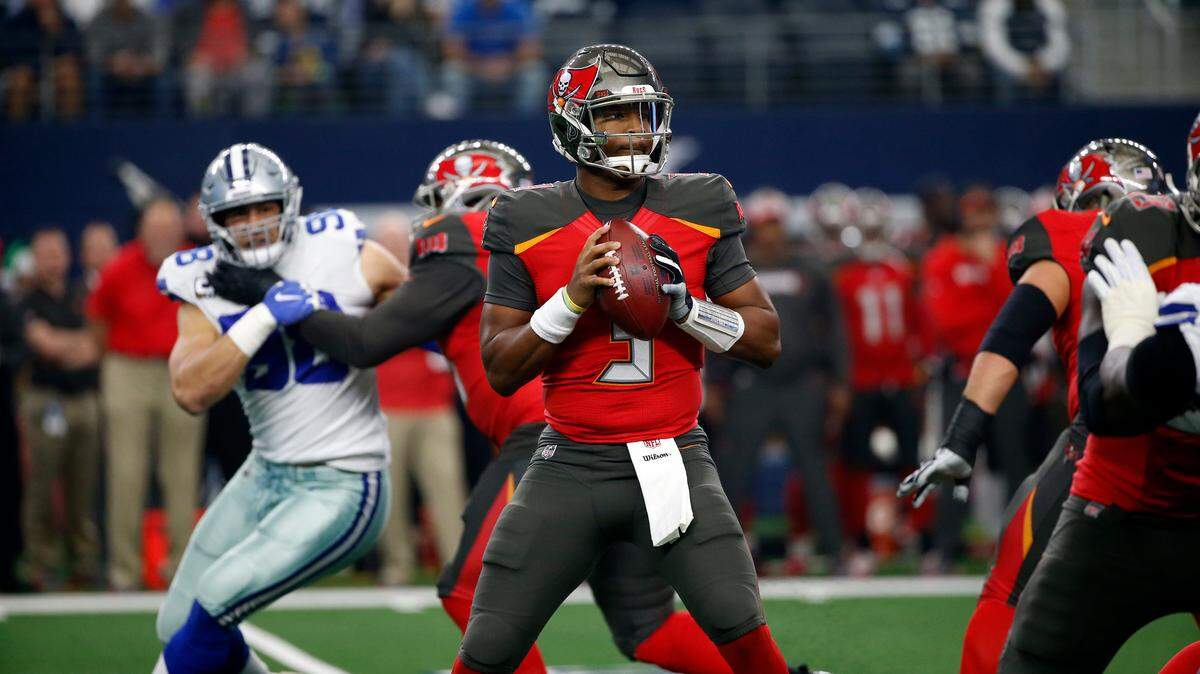 Tampa Bay Buccaneers quarterback Jameis Winston (3) prepares to throw a pass under pressure in the first half of an NFL football game against the Dallas Cowboys in Arlington, Texas, Sunday, Dec. 23, 2018. (AP Photo/Ron Jenkins)