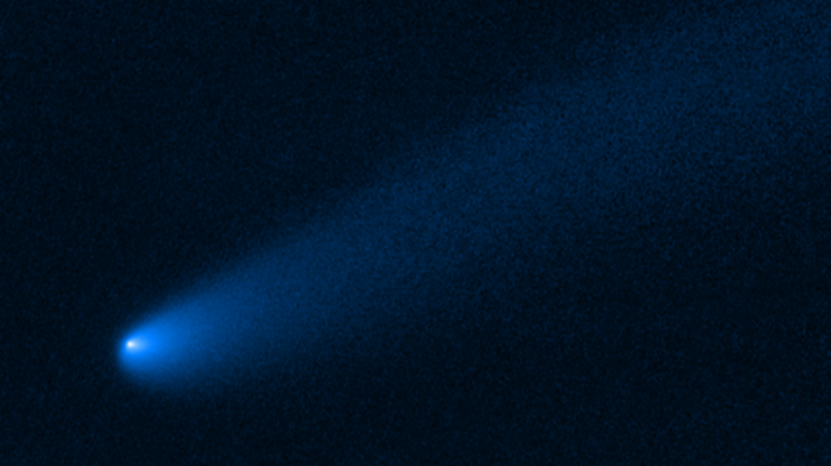 NASA’s Hubble Space Telescope snapped this image of the young comet P/2019 LD2 as it orbits near Jupiter’s captured ancient asteroids, which are called Trojans.