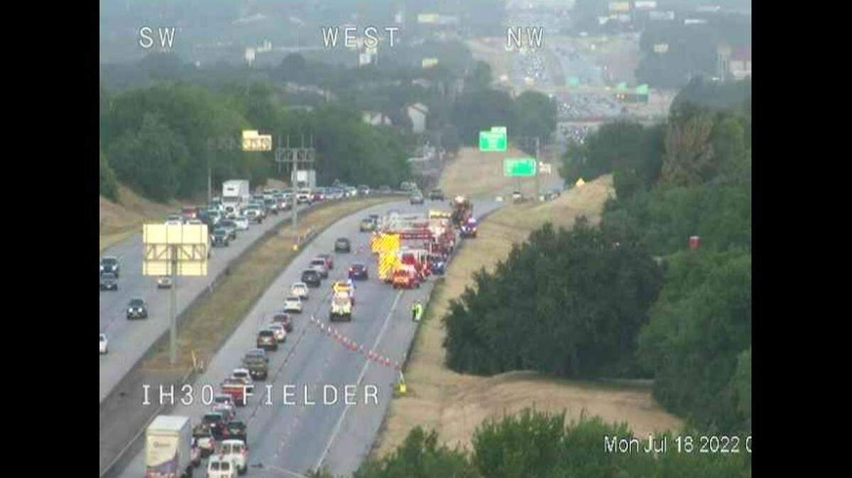 A loaded cattle trailer crashed early Monday on Interstate 30 in Arlington after the vehicle was hit by a semi-truck, Arlington police said.