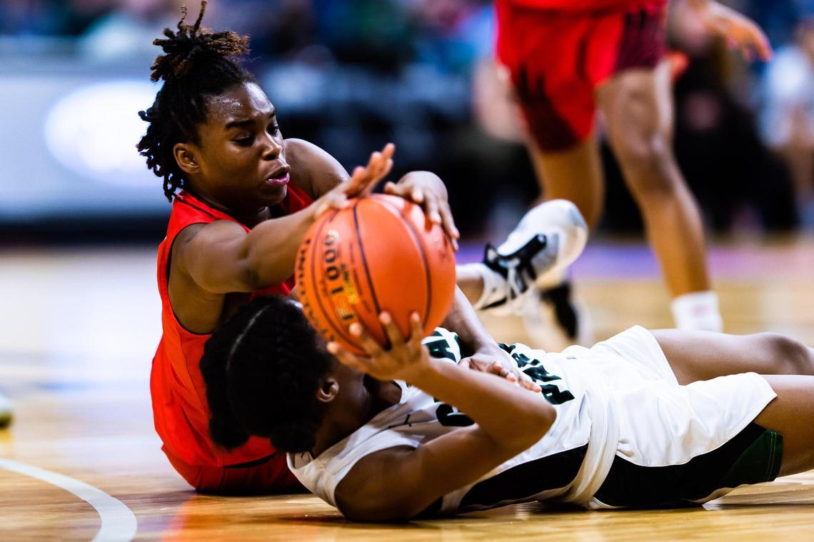 Journee Chambers (23) fights to tie up the ball during the 5A state final between Frisco Liberty and Cedar Park at the Alamodome in San Antonio Texas, on March 10, 2021. Cedar Park went on to win 46-39. (Photo by Matt Smith. Special to the Star-Telegram).