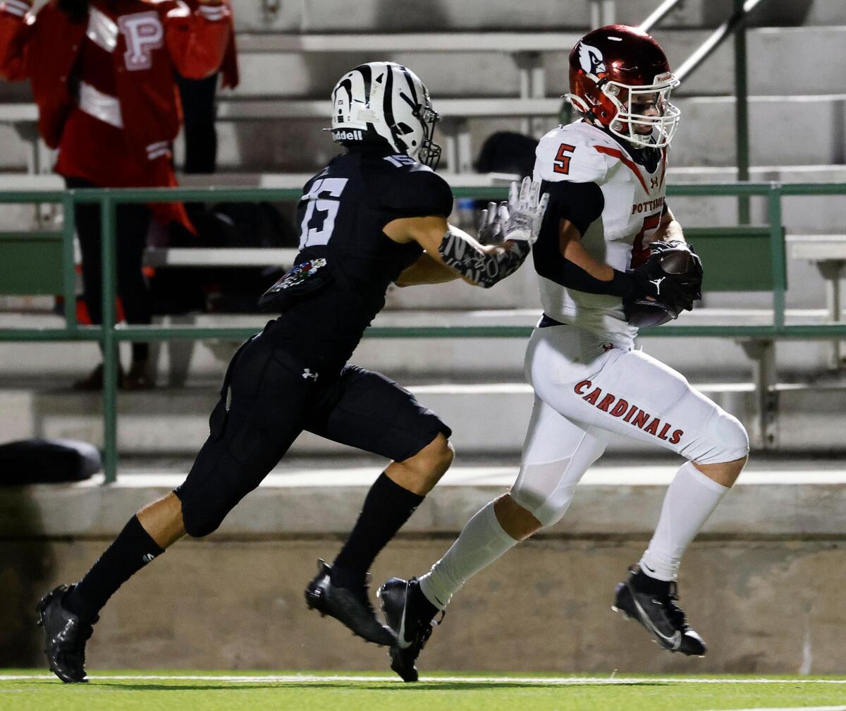 Pottsboro running back Major McBride (5) escapes the grasp of Grandview safety Anthoney Berrones (15) to go in for a touchdown during a UIL Class 3A Division 1 area round playoff football game at Mesquite Memorial Stadium in Mesquite, Texas, Thursday, Nov. 16, 2023.