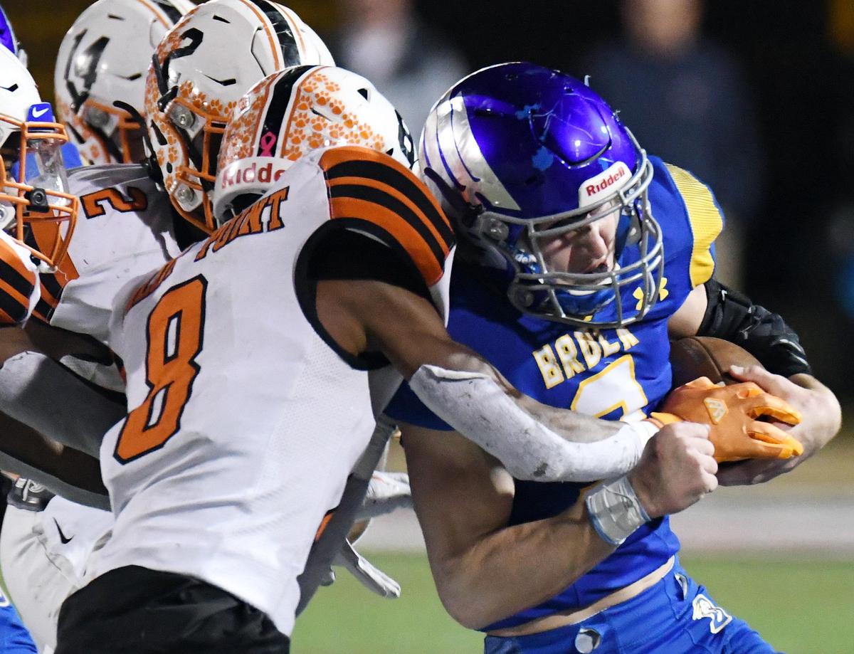 Brock’s Cash Jones, right is forced out of bounds by Pilot Points Jabari Anderson 8, and Javon Bruce after getting a first down in the second quarter of their Class 3A Division I quarterfinal football game Friday, December 6, 2019 at Pennington Field in Bedford, Texas. Special/Bob Haynes