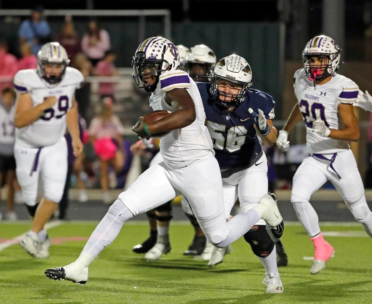 Timber Creek quarterback Lior-jire Mendji (6) works around the left side in the first half of a District 4-6A high school football game at Keller ISD Stadium in Keller, Texas, Thursday, Oct. 27, 2022. Keller led Timber Creek 20-3 at the half. (Special to the Star-Telegram Bob Booth)