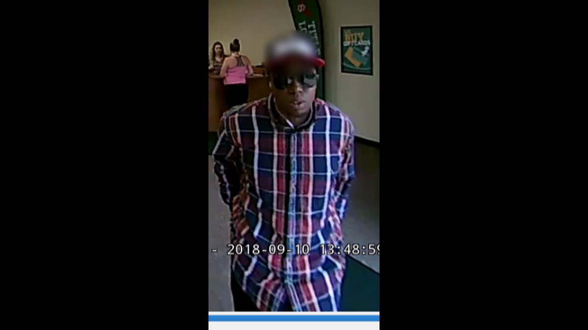 Fort Worth police are looking for a man who allegedly robbed a cash checking store using a threatening note.