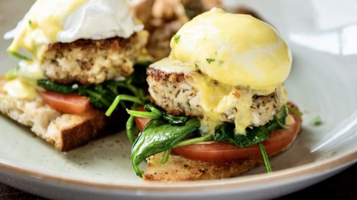 Crabcake Benedict at CRÚ Food & Wine Bar.
