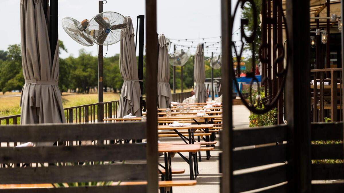 The patio at HG Sply Co. is empty during lunch hour on Thursday, July 21, 2022, at HG Sply Co. in Fort Worth. The restaurant has completely closed the patios.