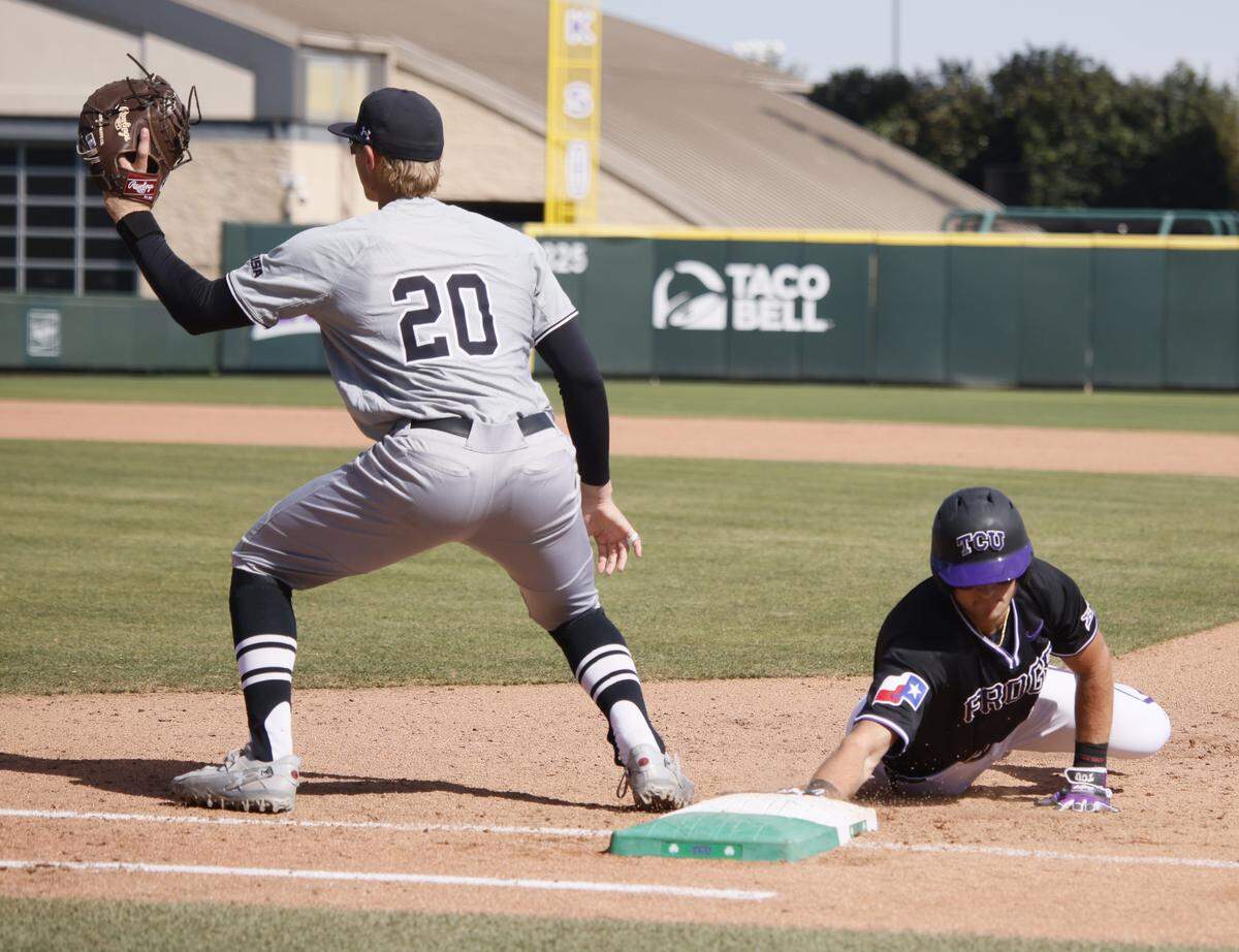 TCU outfielder Chase Brunson (15) dives safely back to first to beat the throw to New Mexico State first baseman Bryce Campbell (20) during an NCAA baseball game at Lupton Field at TCU in Fort Worth, Texas, Tuesday, March, 17, 2026.