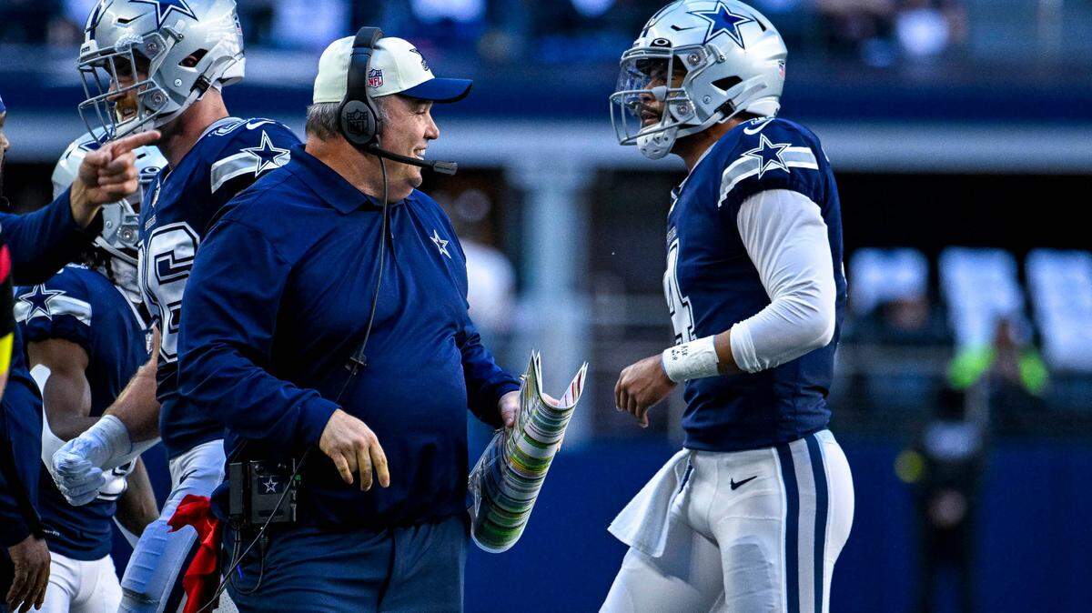 Dallas Cowboys head coach Mike McCarthy and quarterback Dak Prescott (4) celebrate a touchdown against the Chicago Bears during the first quarter at AT&T Stadium. The Cowboys won 12 games last season and are looking to repeat that success.