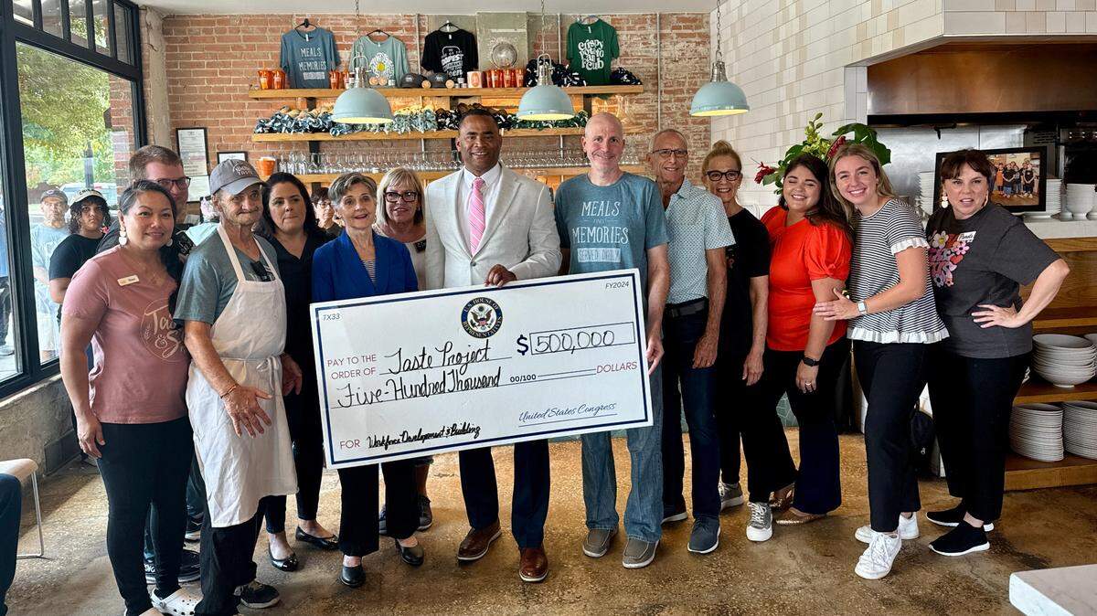 The Taste Project staff received a funding check from U.S. Rep. Marc Veasey on Tuesday in Fort Worth.