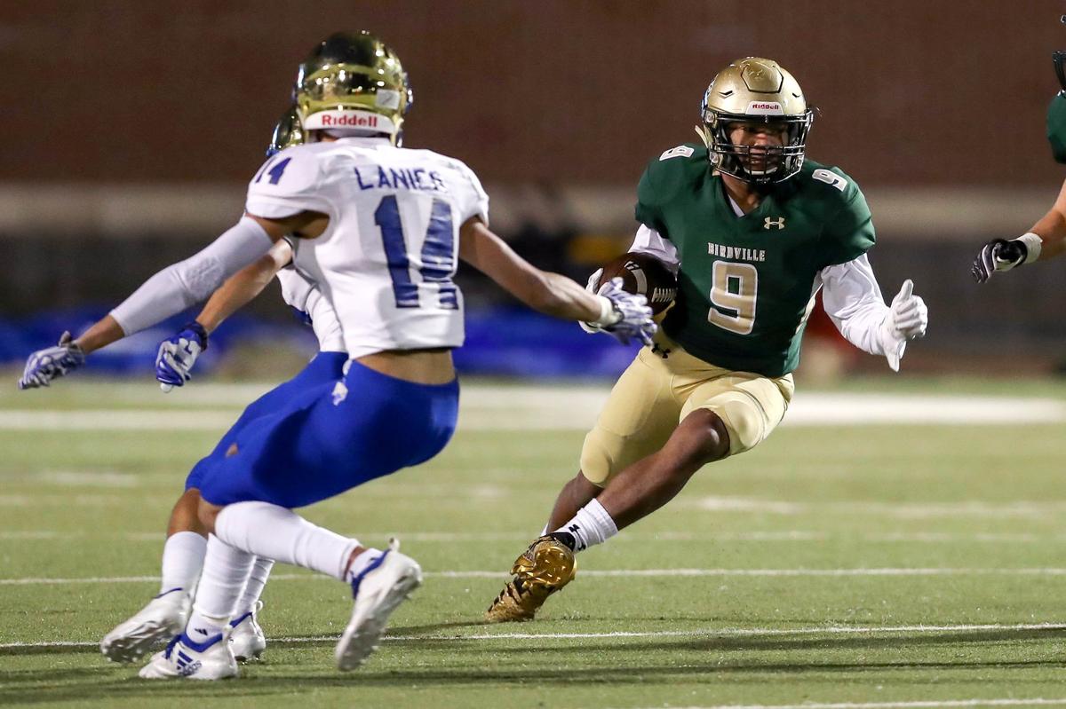 Birdville running back Laderrious Mixon (9) looks for running room against Fort Worth Boswell during the first half, Thursday night, November 15, 2018 in the 5A Division I Bi-District played at Birdville ISD Fine Arts Athletics Complex in N. Richand Hills, TX