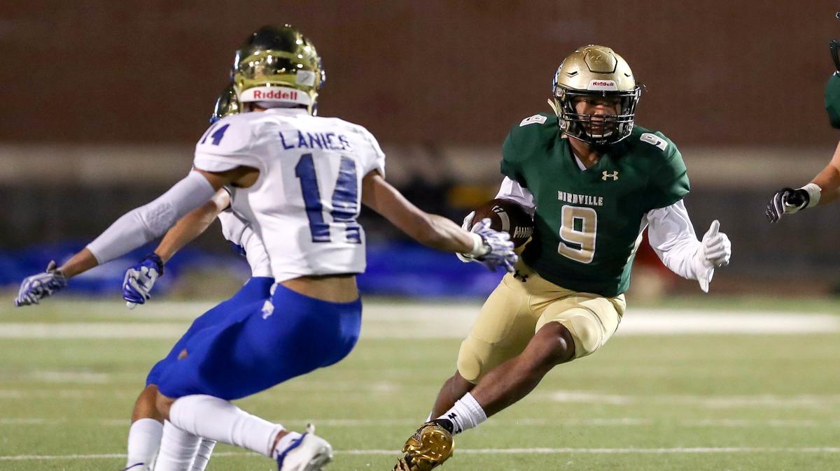 Birdville running back Laderrious Mixon (9) looks for running room against Fort Worth Boswell during the first half, Thursday night, November 15, 2018 in the 5A Division I Bi-District played at Birdville ISD Fine Arts Athletics Complex in N. Richand Hills, TX