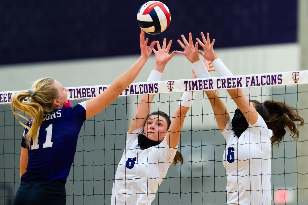 Katelynn Croshaw (8) and Adeline Miller (6) attempt to block Halle Sherlock (11) during a district game between Byron Nelson and Timber Creek, at Timber Creek in Keller on October 17, 2020. (Photo by Matt Smith. Special to the Star-Telegram).