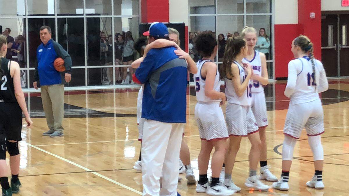 Senior McKenna Whites hugs father Wes after Lake Country Christian won the TAPPS 4A state title 44-19 vs. Brentwood, Saturday March 3, 2018.