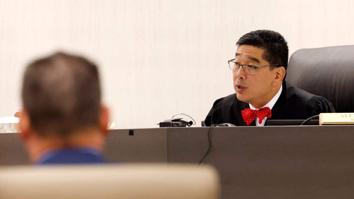323rd District Judge Alex Kim reads the jury’s sentence on Thursday, Sept. 21, 2023, of the teenager who fatally shot another student at Arlington’s Lamar High School. The teen received the maximum sentence of 40 years.
