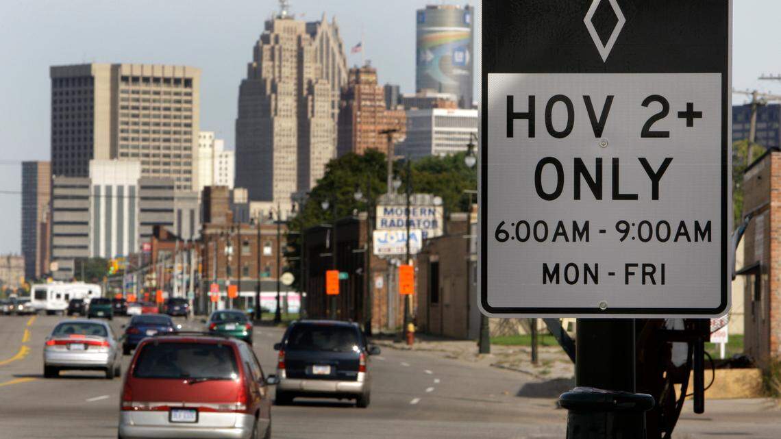 An HOV lane sign is shown in Detroit. Brandy Bottone of Plano, Texas, got a traffic ticket for driving alone in an HOV lane outside Dallas. Being pregnant, she argued against the ticket, sparking debate.