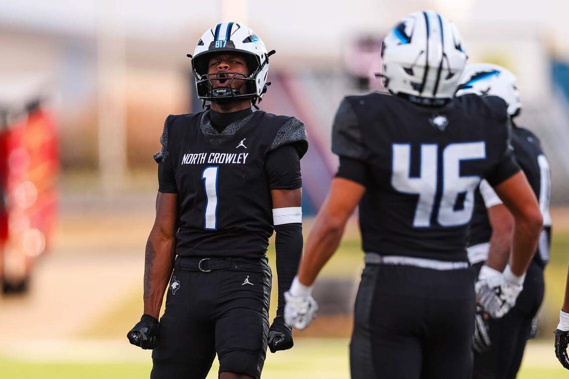 North Crowley safety Aaron Bradshaw (1) screams in celebration toward his teammate in a Class 6A Division I regional playoff against Coppell on Saturday, Nov. 29, 2025, at Midlothian ISD Stadium in Midlothian.