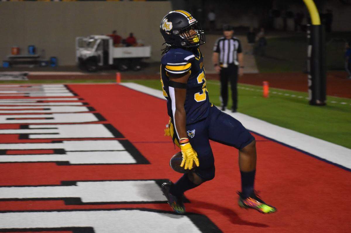Arlington Heights’ Latreal Brooks (34) scores a touchdown against Grapevine during a high school football game at Farrington Field in Fort Worth, Texas Friday, October 27, 2023.