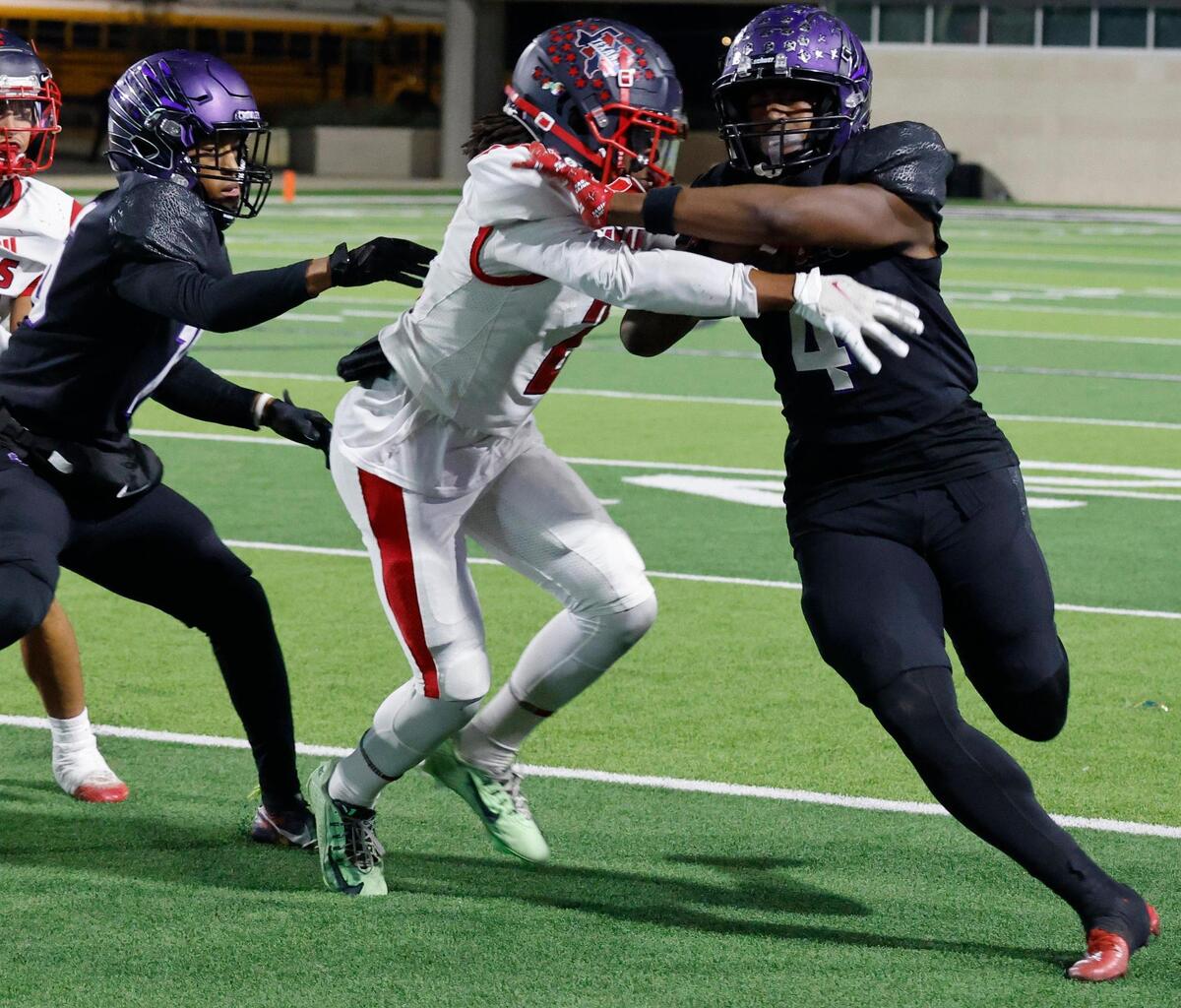Northwest defensive back Daven Taylor (2) attempts to bring Crowley wide receiver Derrick Tasby (4) down during a UIL Class 6A D2 Bi-district playoff football game at Crowley ISD Multi-Purpose Stadium in Fort Worth, Texas, Friday, Nov. 15, 2024.