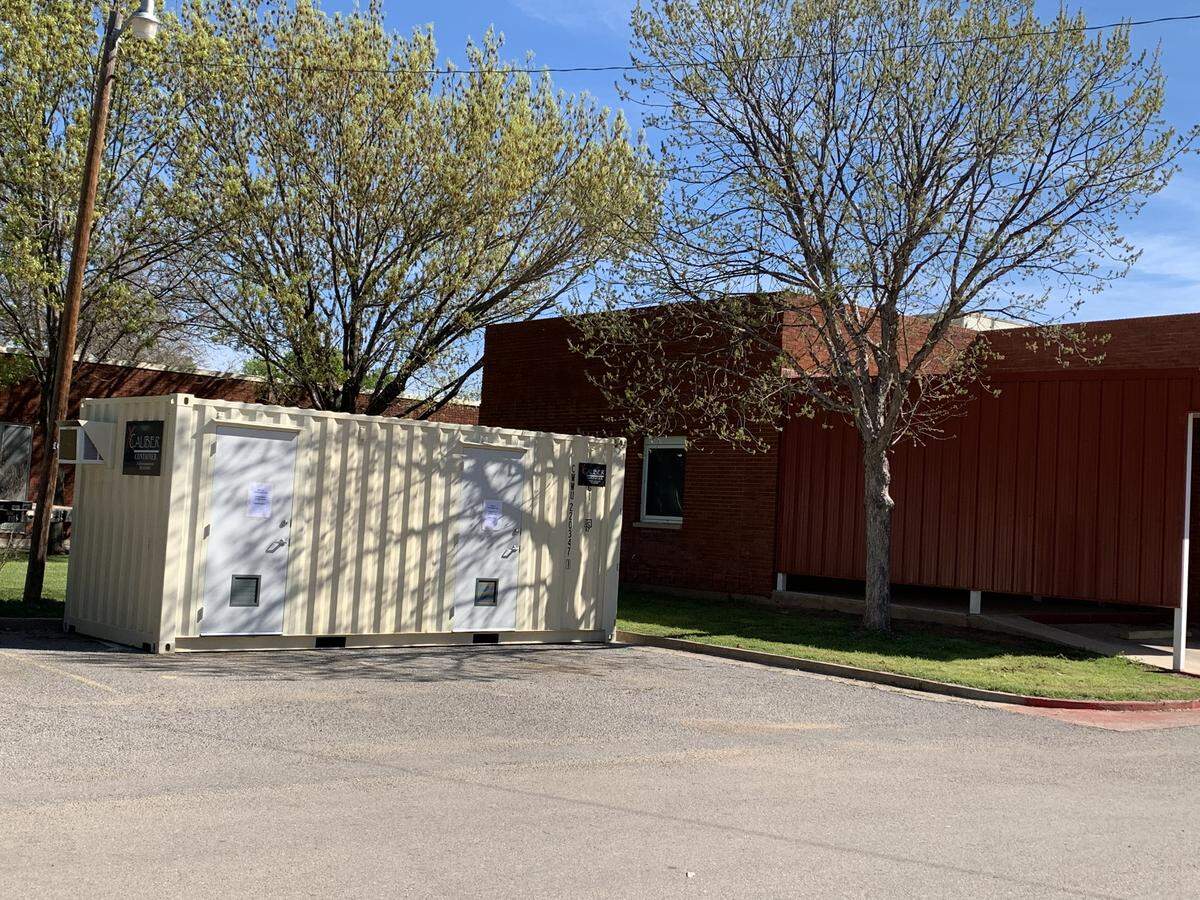 A coronavirus testing facility with two rooms designed by XCaliber Container sits outside of Hamilton Hospital in Olney. The company has transitioned into making testing facilities to help hospitals during the coronavirus crisis.