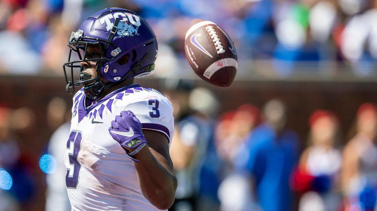 TCU running back Emari Demarcado tosses the football behind him after scoring a touchdown on Saturday, Sept. 24, 2022, at the Gerald Ford Stadium in the Southern Methodist University in Dallas, Texas.