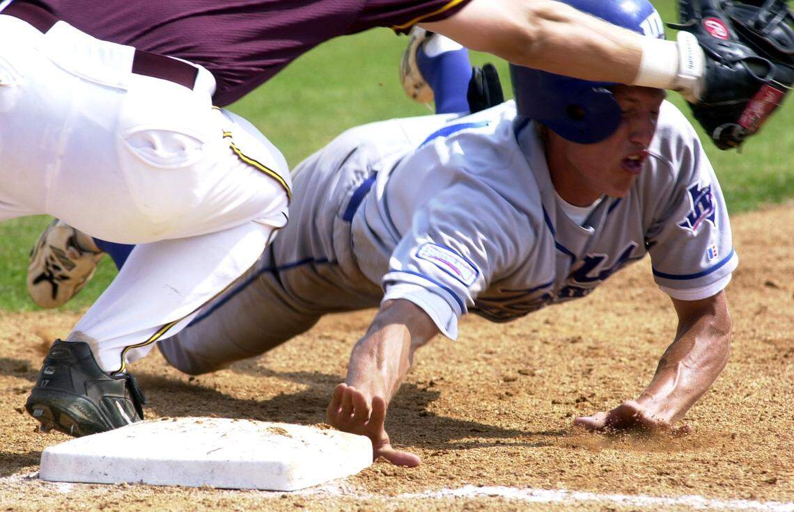 Hunter Pence, diving back to first base, played at UT-Arlington after transferring from Texarkana College. The Arlington High graduate played at UTA in 2003 and 2004.