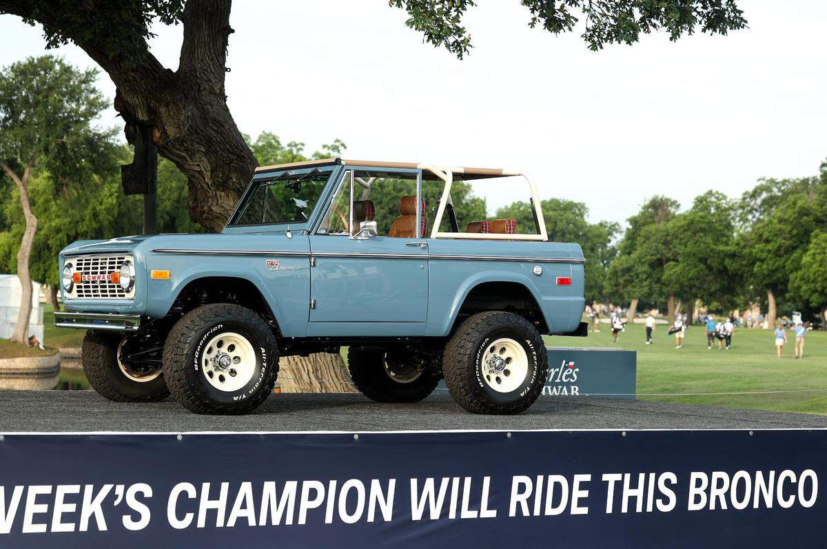 A 1973 Schwab Bronco sits on display during the first round of the Charles Schwab Challenge in May 2023 at Colonial Country Club in Fort Worth.