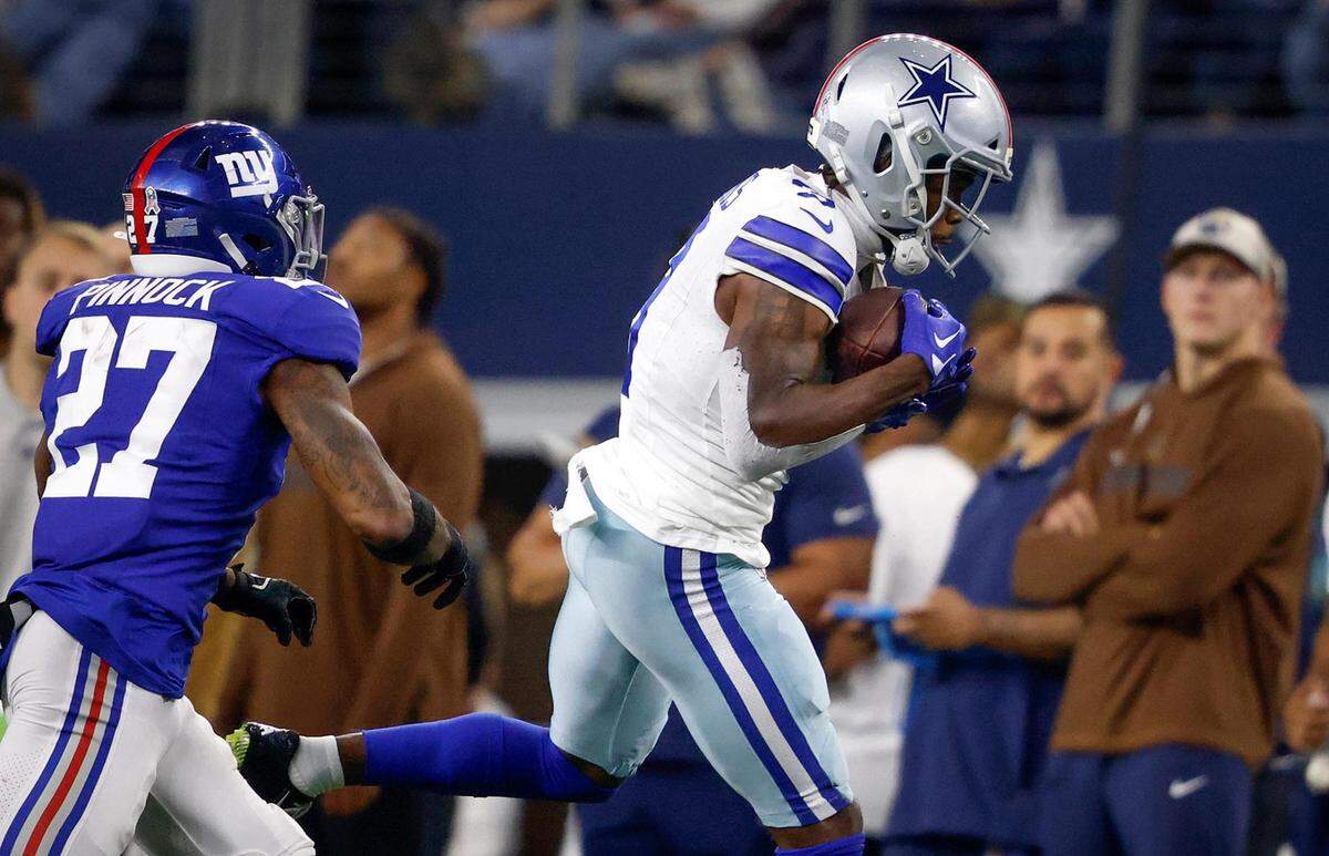 Dallas Cowboys wide receiver Brandin Cooks catches the ball while being defended by New York Giants’ Jason Pinnock on Sunday, November 12, 2023, at AT&T Stadium in Arlington.