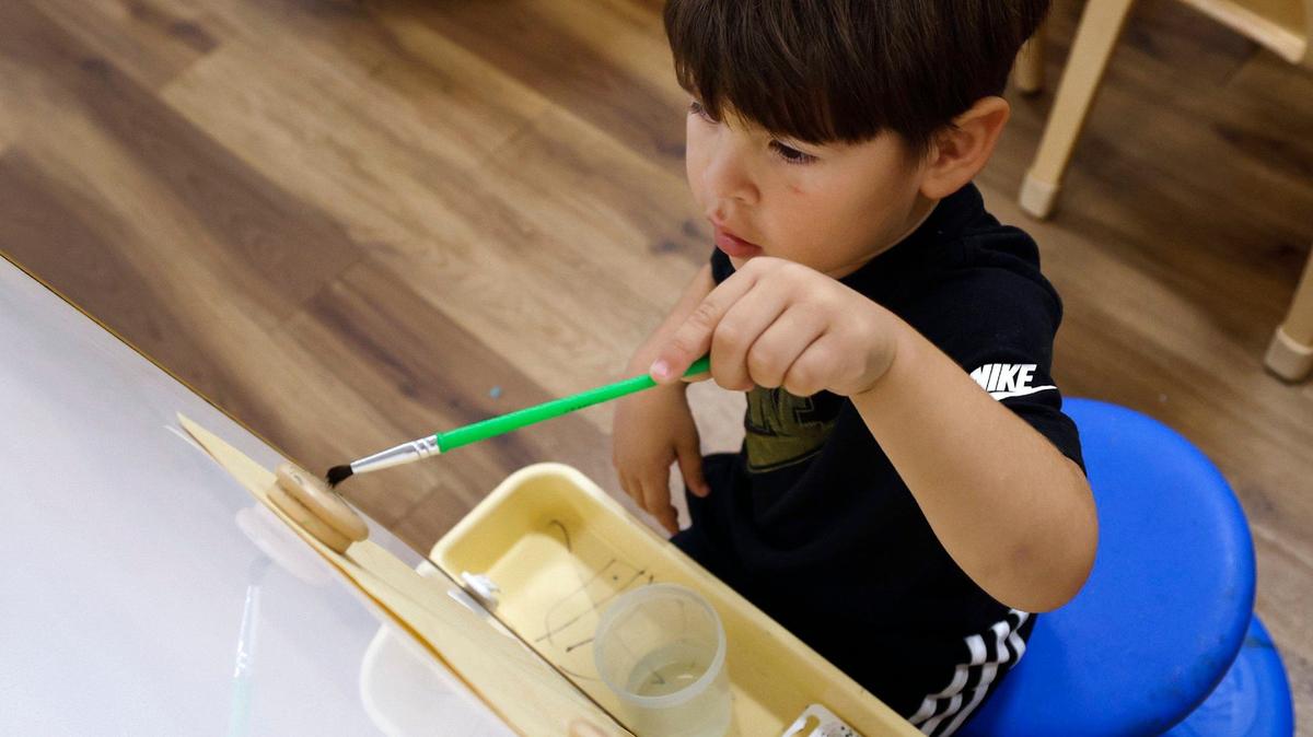 A 3-year-old student paints while attending pre-K at The Morris Foundation Child Development Center on Tuesday, Sept. 24, 2024. Fort Worth ISD and PreK Today partnered this school year to provide pre-K to Fort Worth ISD students at community-based Head Start centers.