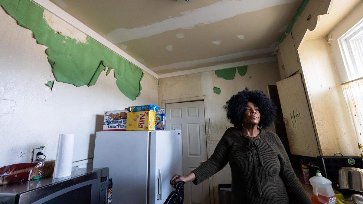 The ceiling in LaToshia Brooks’ kitchen collapsed after last year’s winter storm. She received help to fix the roof but many problems remain, which she cannot afford to fix.