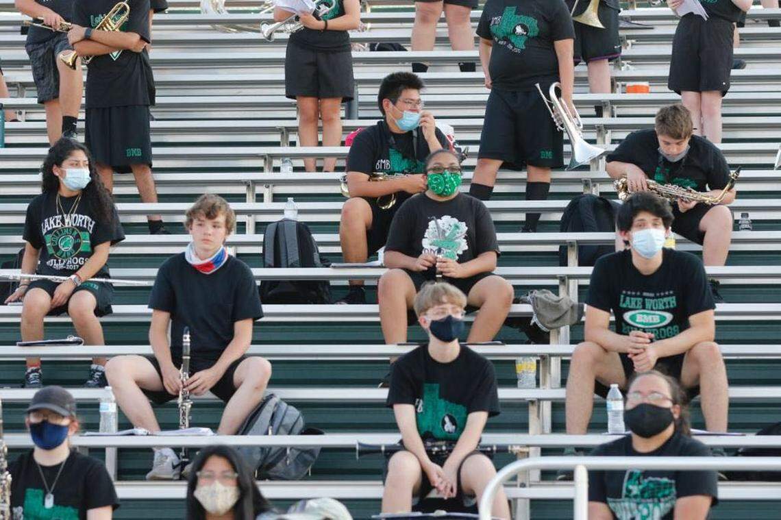 Lake Worth students wear masks and practice social distancing during the Lake Worth-McGregor high school football game, Aug 28. 2020. (Bob Booth/Special to the Star-Telegram)