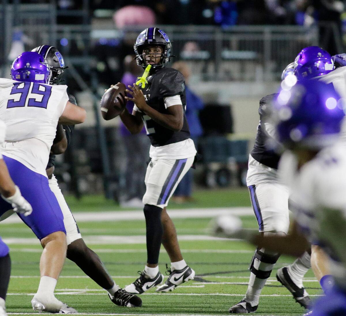 North Crowley’s Chris Jimerson Jr. looks for a receiver during a UIL football game at Crowley ISD Multi Purpose Stadium on Friday , October 18, 2024.