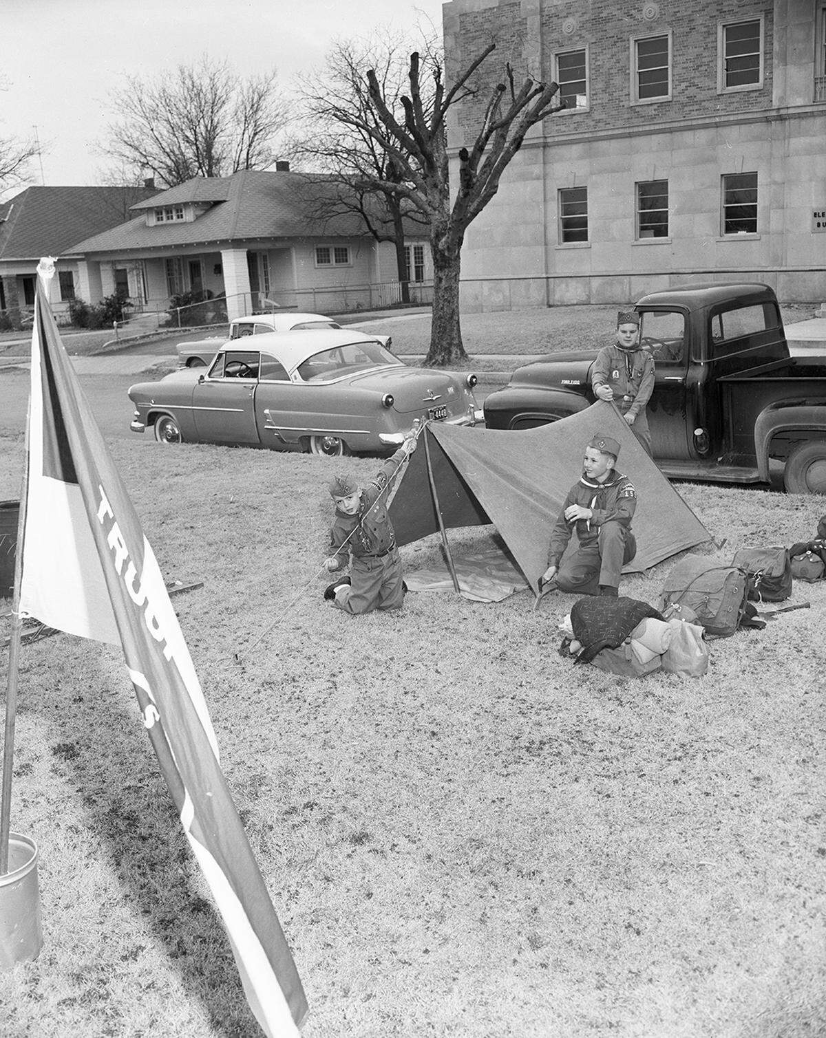 Feb. 7, 1959: Starting off Boy Scout week on Saturday by exhibiting camping skills, three scouts pitch a tent on the parkway of Circle Park Boulevard. They are, left to right, Joe Moore of 2902 North West 26th, Roy Messick of 2717 North West 31st and Eugene Johnson of 2817 North West 29th.
