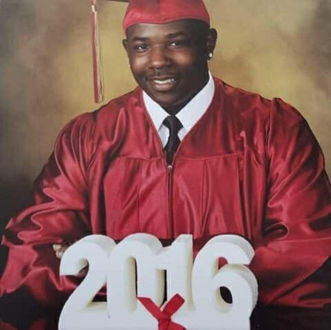 Jordan Miles graduation photo. Miles had accumulated 26 credits but was killed before he was able to graduate, according to his mother, Akua Smith