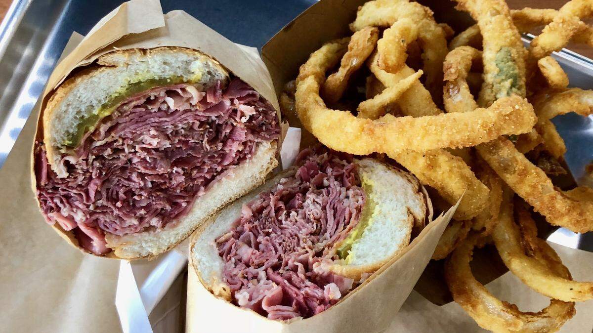 A shaved-pastrami dip with hand-breaded onion rings at Everest Burgers, new near the Southlake-Keller city border.